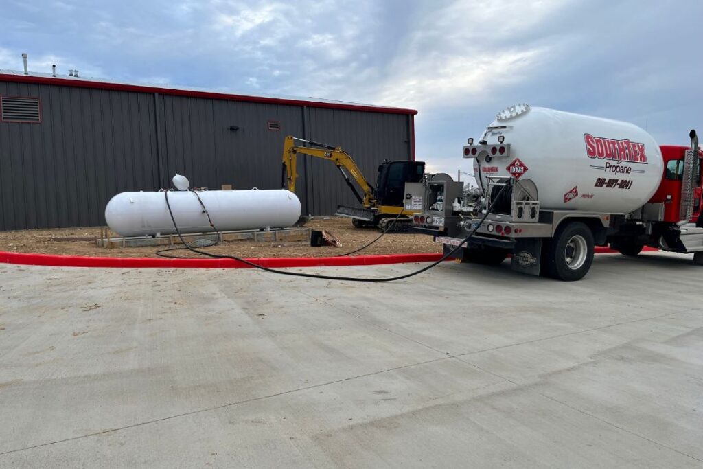 SouthTex Propane supply truck refilling a propane tank